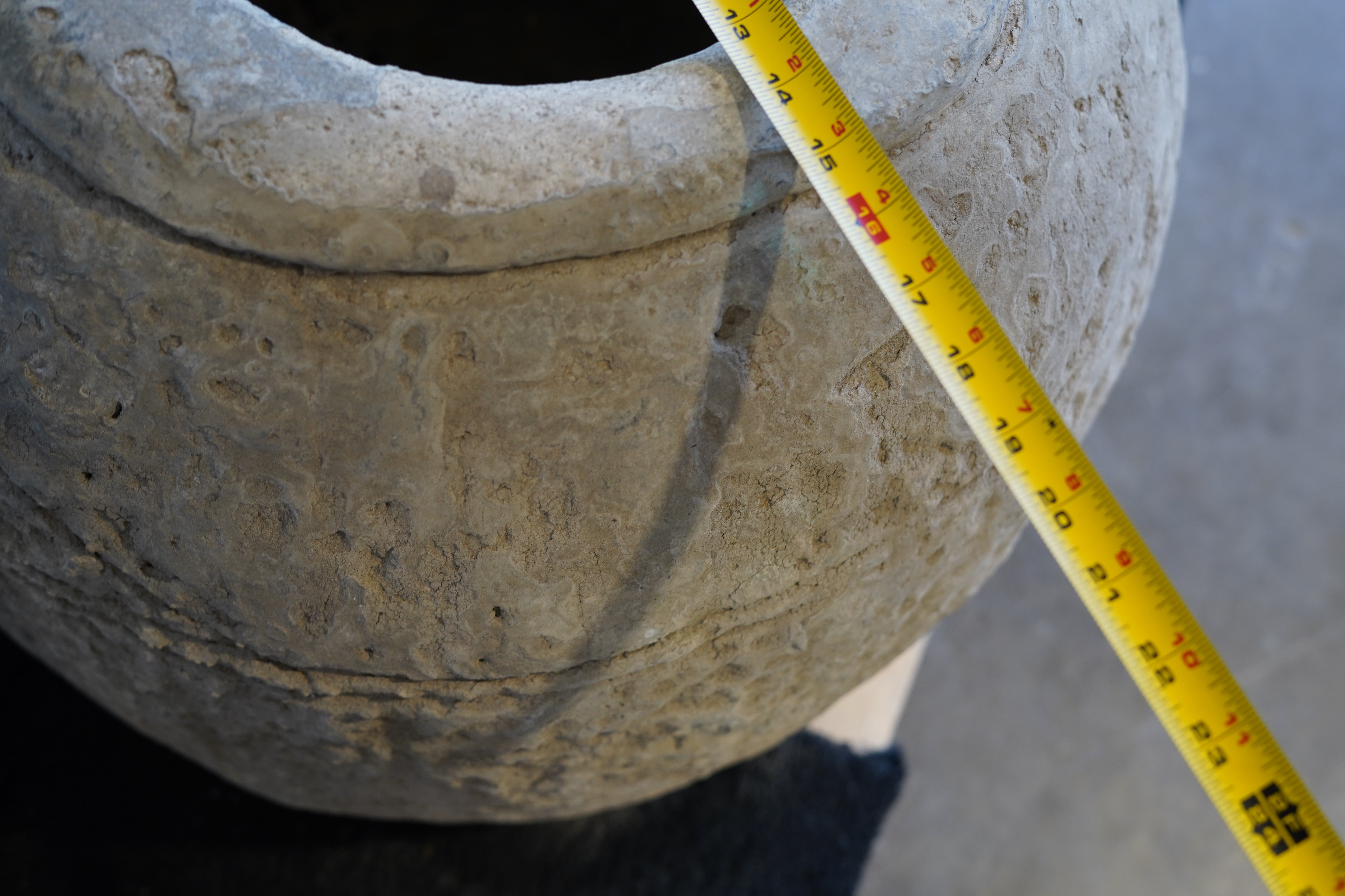 Measurement of mouth of vintage hand-carved limestone planter. 13" w opening and 15" wide at the top. 20" W at the base.