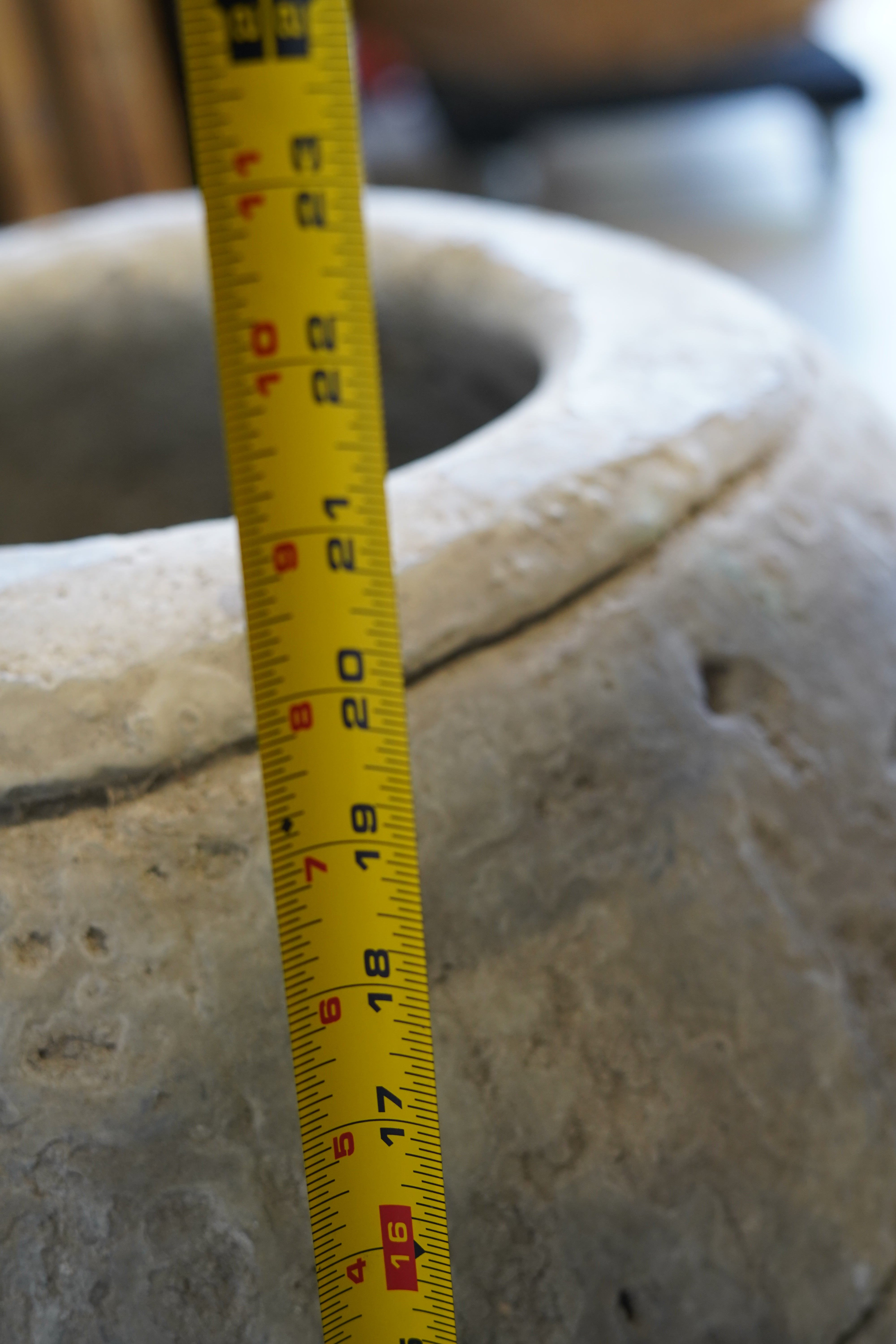 Close up of vintage hand-carved limestone planter.