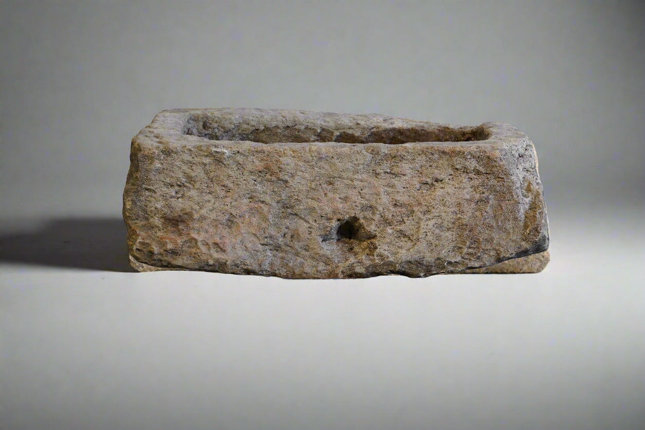 Vintage Limestone Trough on plain white background. 10" H x 30" L x 19" W