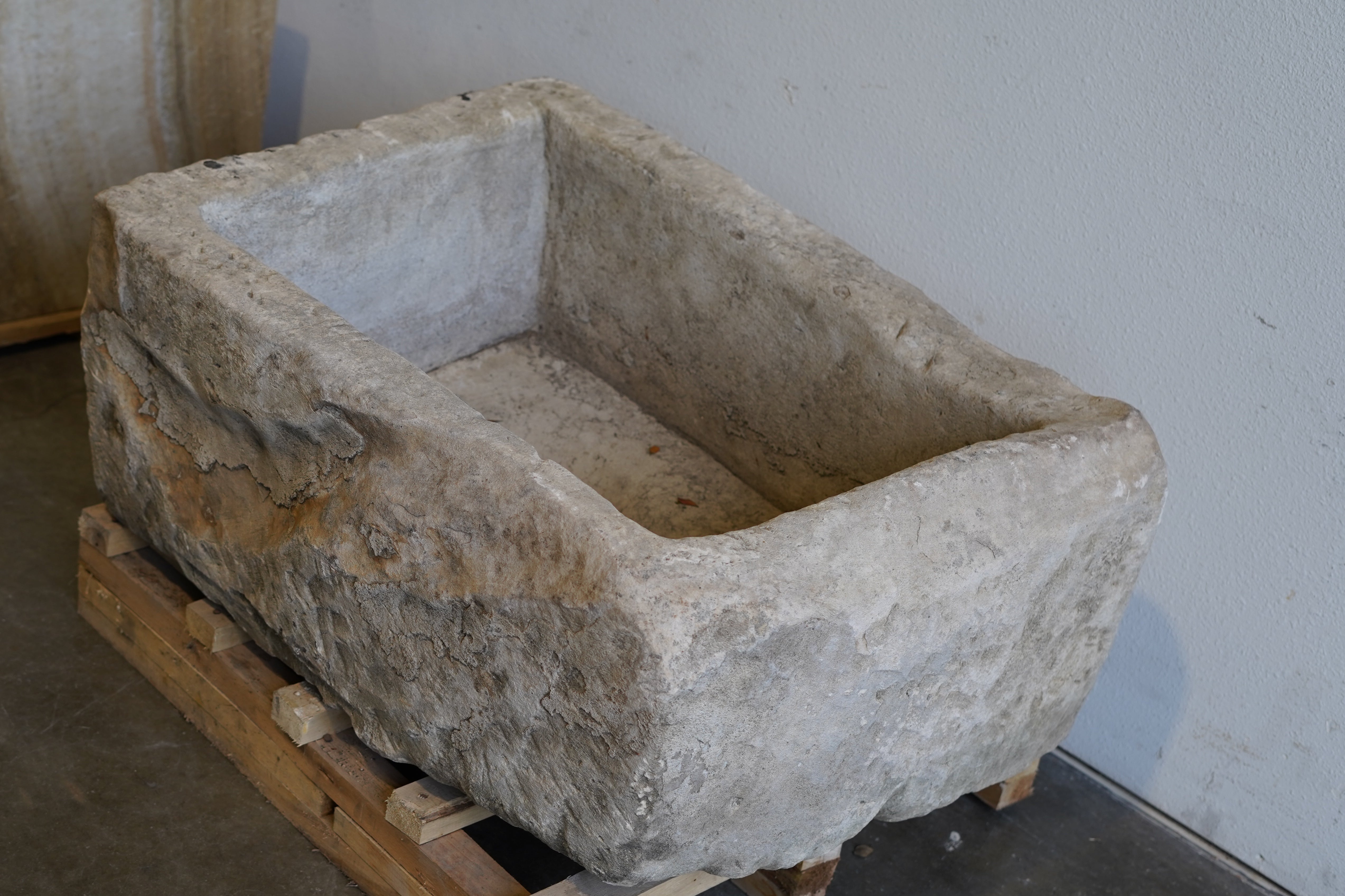 Top view of Vintage hand-carved limestone trough. 
