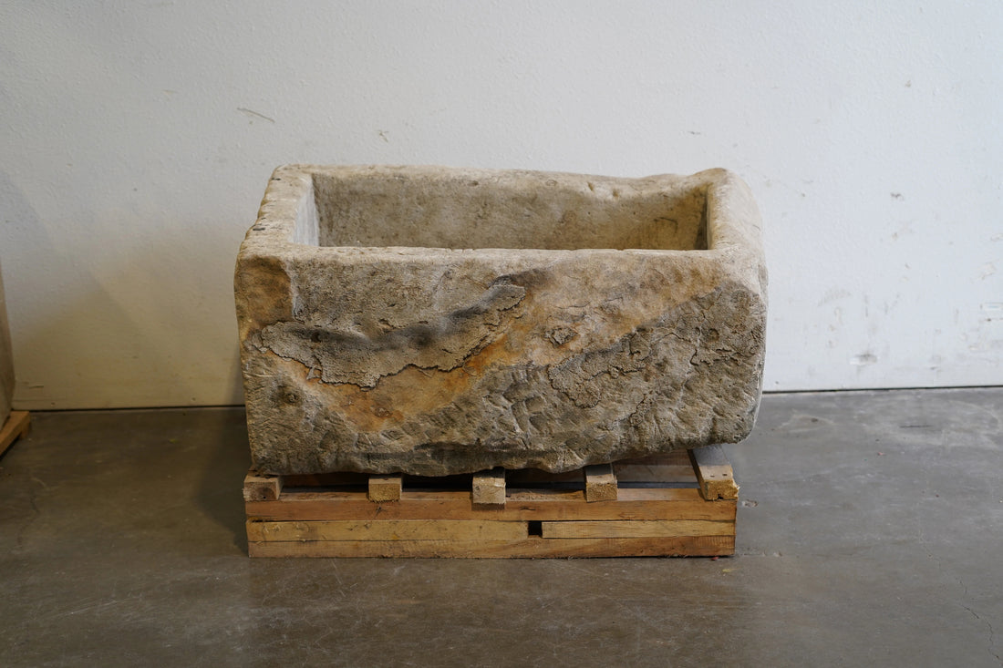 Vintage hand-carved limestone trough. 