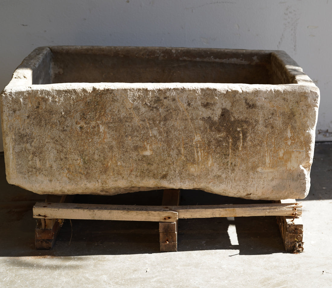 Vintage Limestone Trough in natural lighting. Dimensions: 37.5" L x 25" W x 16.5" H