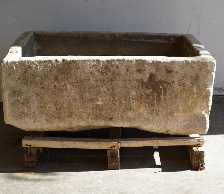 Vintage Limestone Trough in natural lighting. Dimensions: 37.5" L x 25" W x 16.5" H