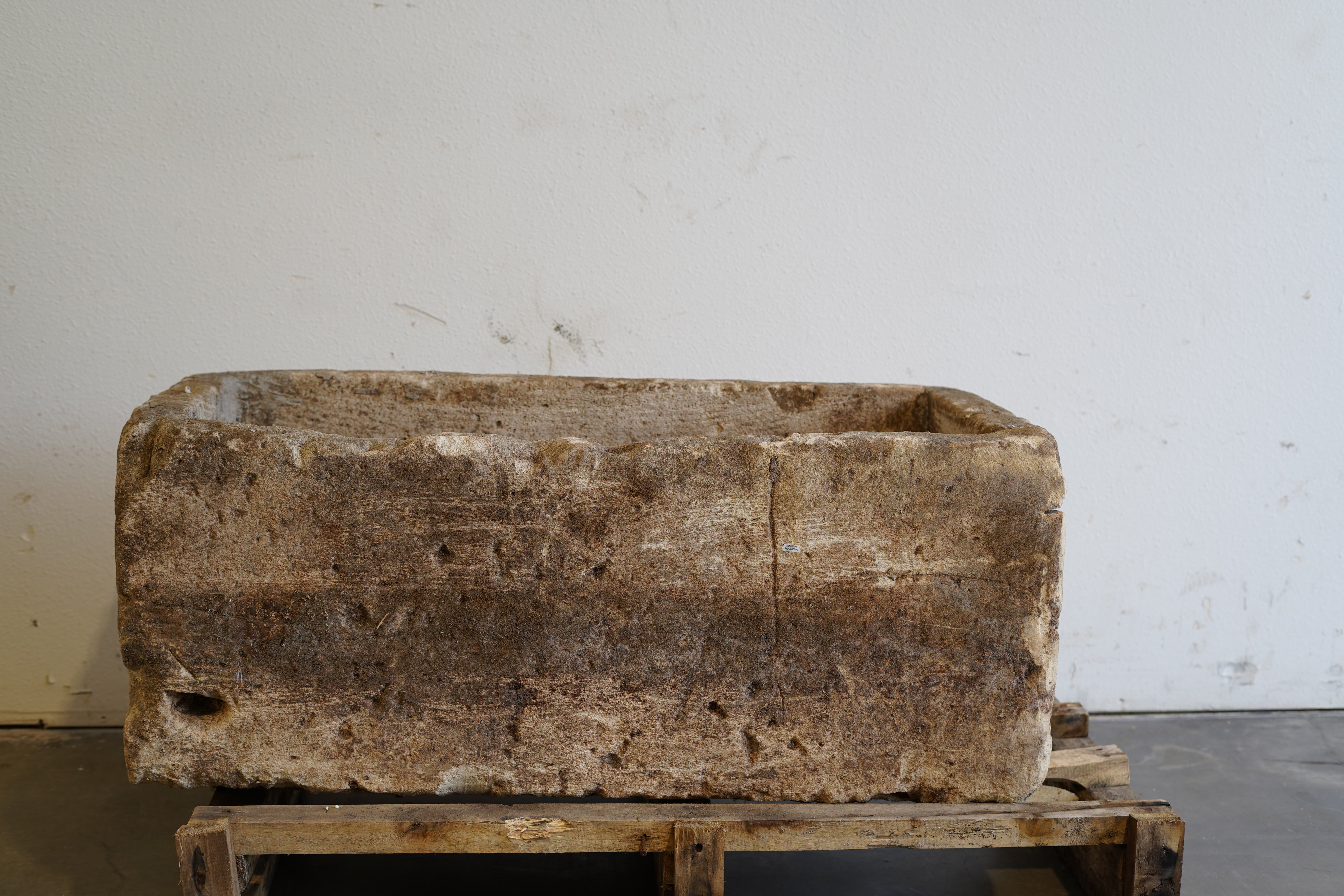Back side of Vintage Limestone Trough

Hand-carved, authentic limestone trough

40" L x 20" W x 16" H