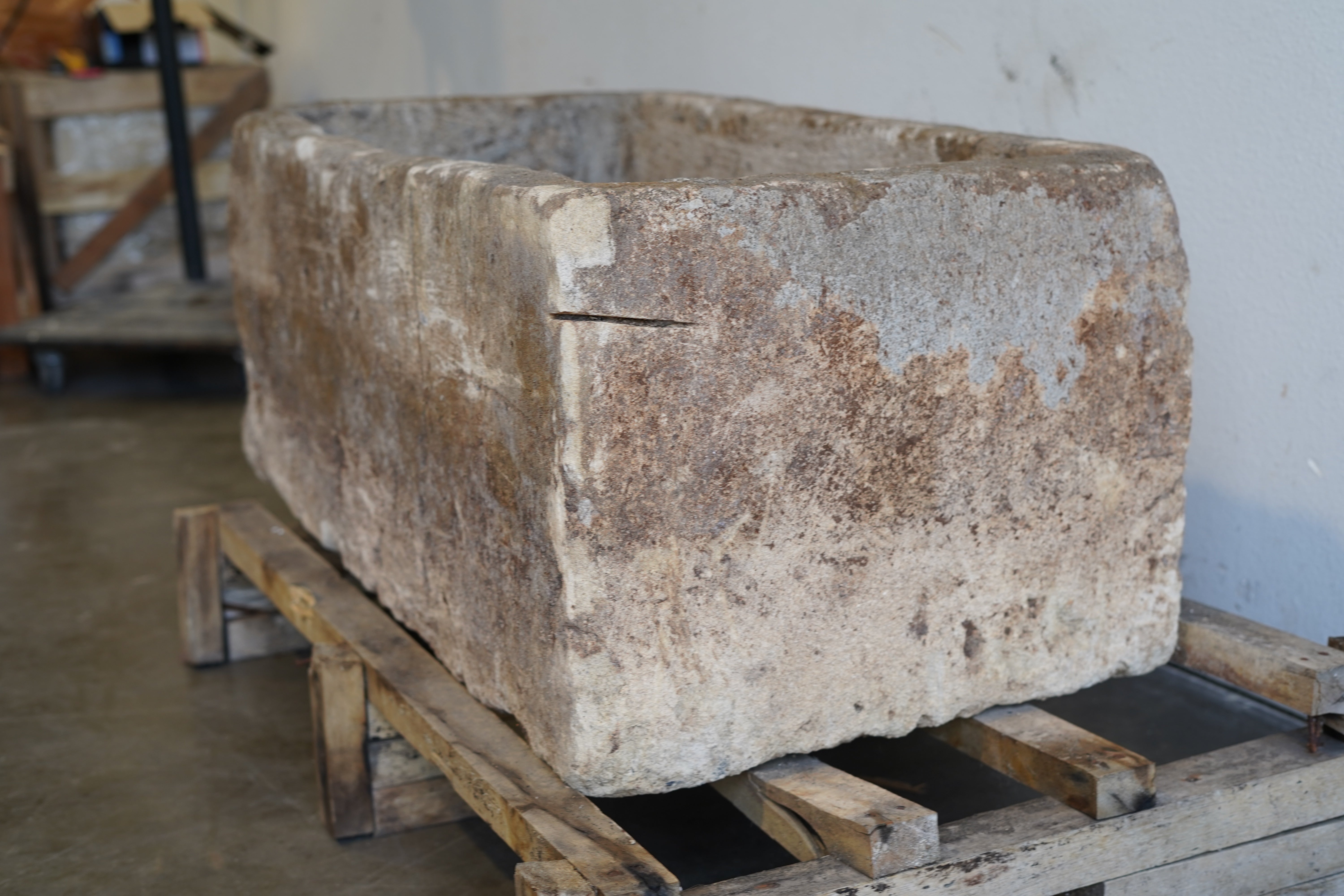 Side view of Vintage Limestone Trough

Hand-carved, authentic limestone trough

40" L x 20" W x 16" H