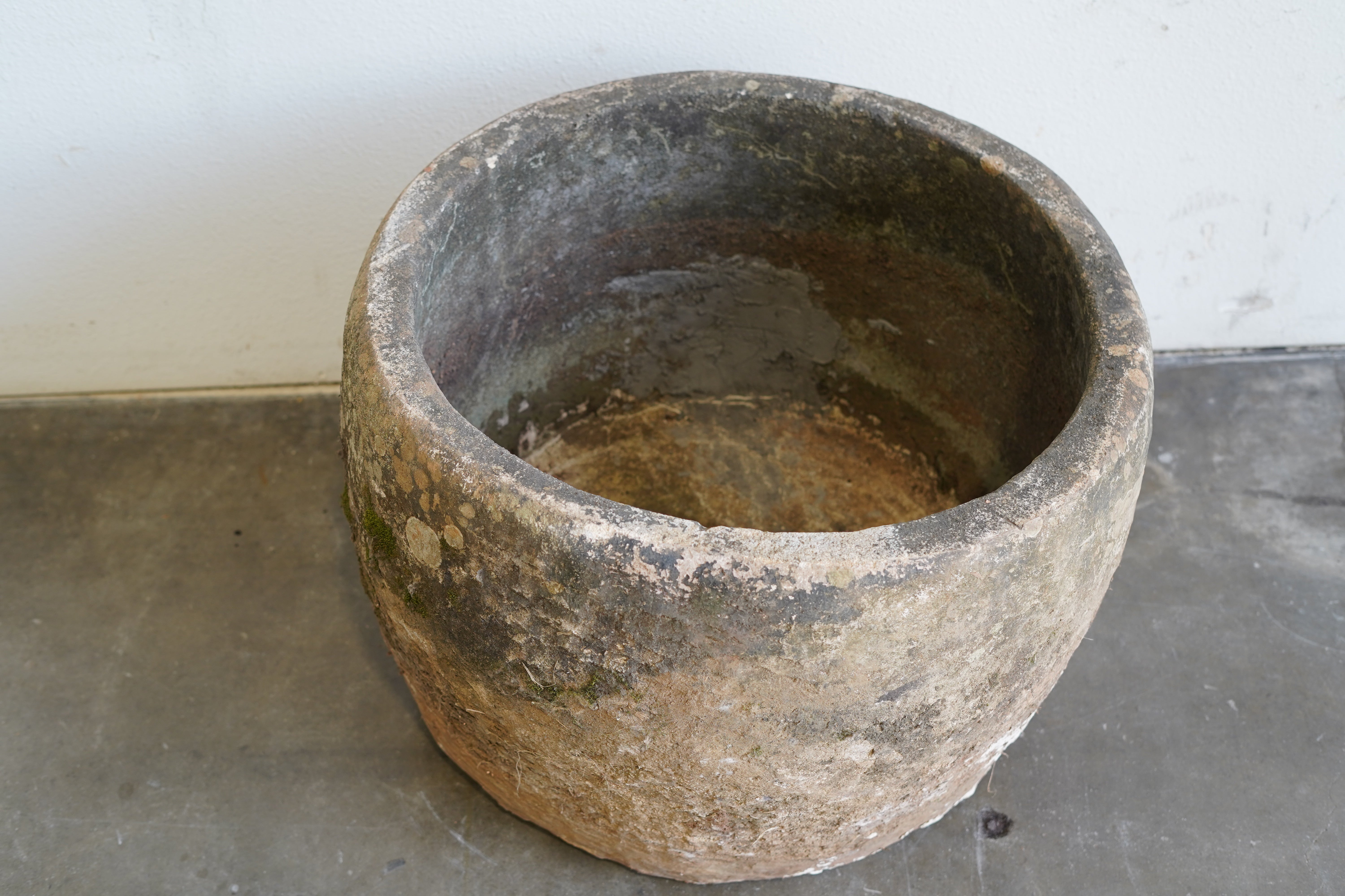Top down view of Round Vintage, Hand-Carved Limestone Planter with beautiful natural aging and patina.&nbsp;

Dimensions: 24" D x 20" H
