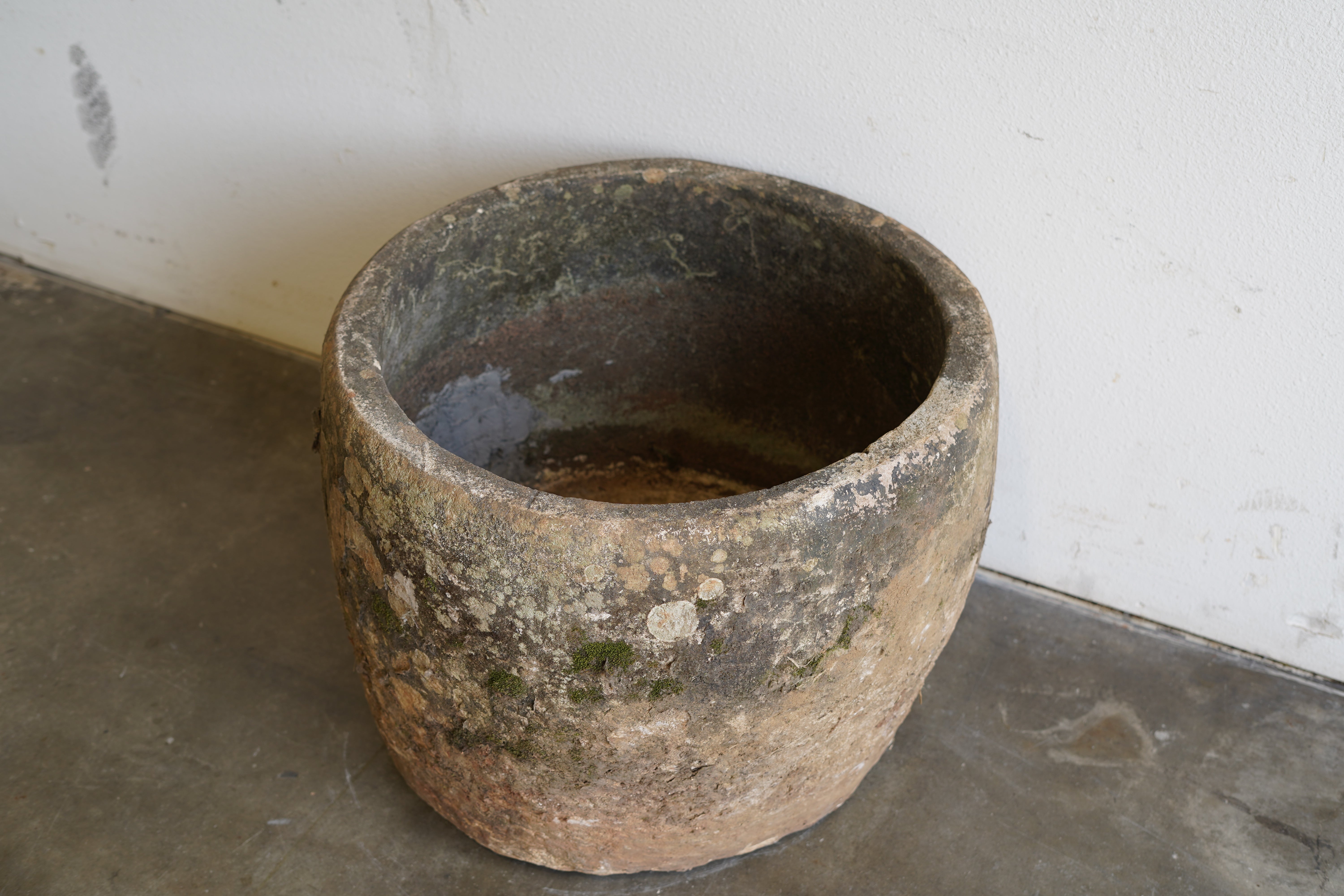 Top view of Round Vintage, Hand-Carved Limestone Planter with beautiful natural aging and patina.&nbsp;

Dimensions: 24" D x 20" H
